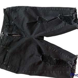 Fashion Nova Black Distressed Jean shorts.